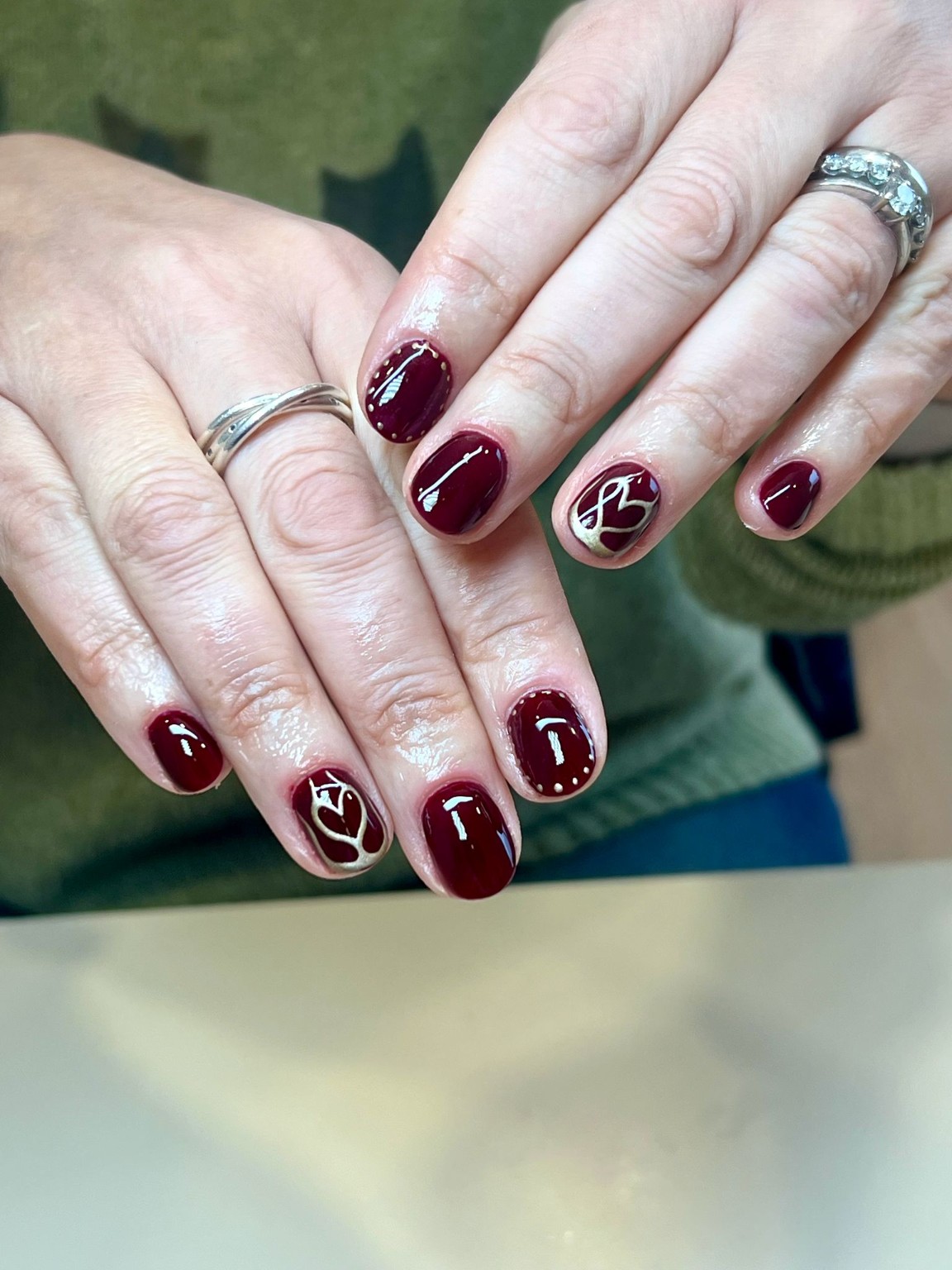 Burgundy nail art by Glamd Room